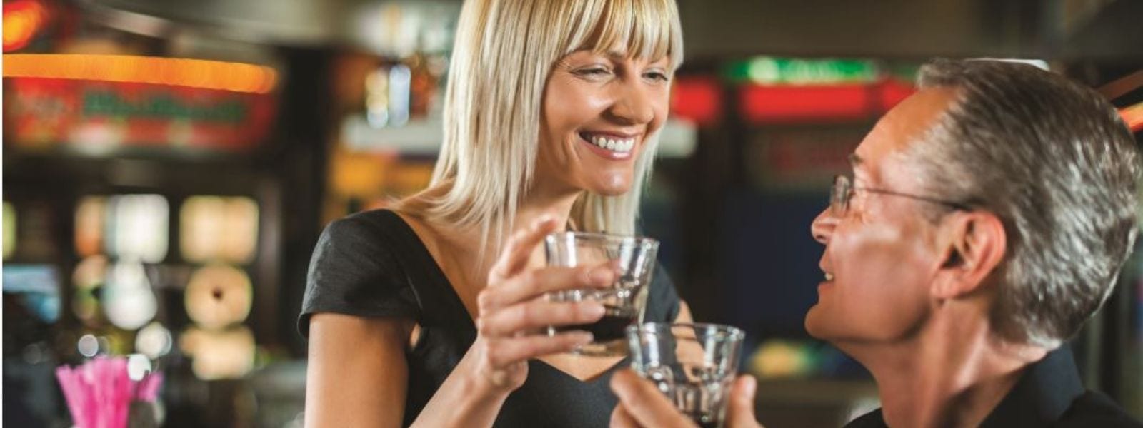 Man and woman drinking at bar in downtown Sarasota